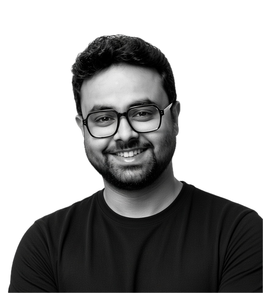 Ankush Bose, smiling, in a black t-shirt